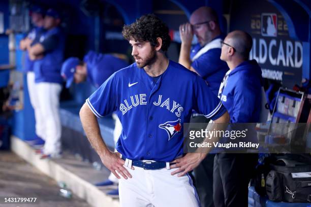 Jordan Romano of the Toronto Blue Jays looks on from the dugout against the Seattle Mariners during the ninth inning in game two of the American...