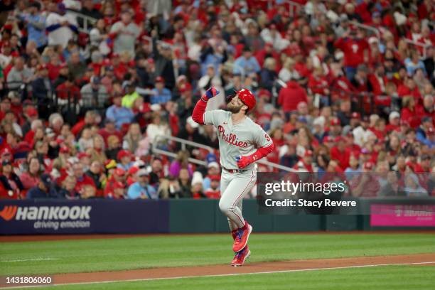 Bryce Harper of the Philadelphia Phillies celebrates after hitting a solo home run against the St. Louis Cardinals during the second inning in game...