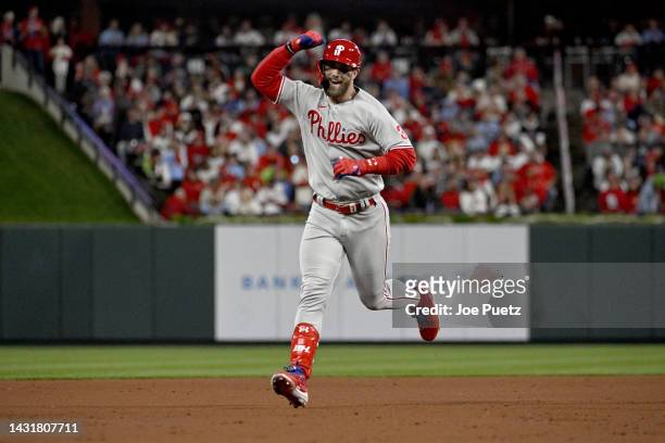 Bryce Harper of the Philadelphia Phillies celebrates after hitting a solo home run against the St. Louis Cardinals during the second inning in game...