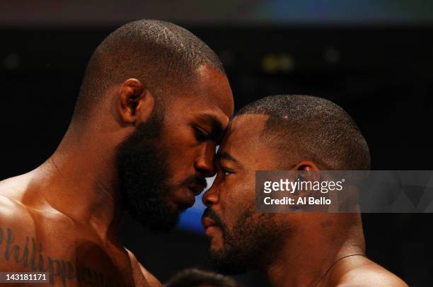 Jon Jones and Rashad Evans face off during the UFC 145 official weigh in at Fox Theatre on April 20, 2012 in Atlanta, Georgia.