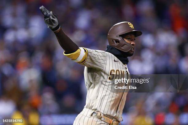 Jurickson Profar of the San Diego Padres hits an RBI single during the fifth inning against the New York Mets in game two of the Wild Card Series at...
