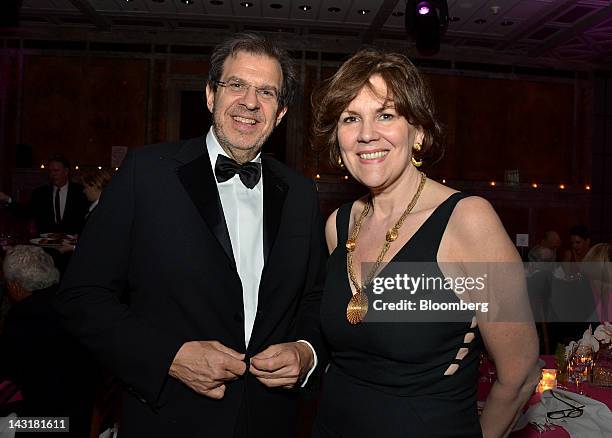 Frederick Iseman, chairman and chief executive of the hedge fund CI Capital Partners LLC, and guest stand for a photograph at the Municipal Art...