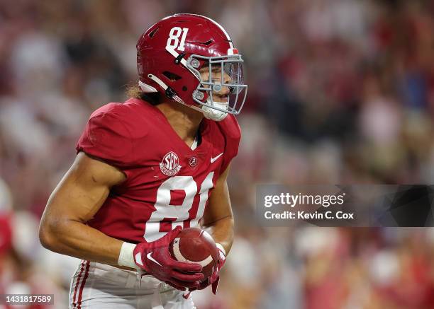 Cameron Latu of the Alabama Crimson Tide reacts after pulling in this touchdown reception against the Texas A&M Aggies during the first half at...