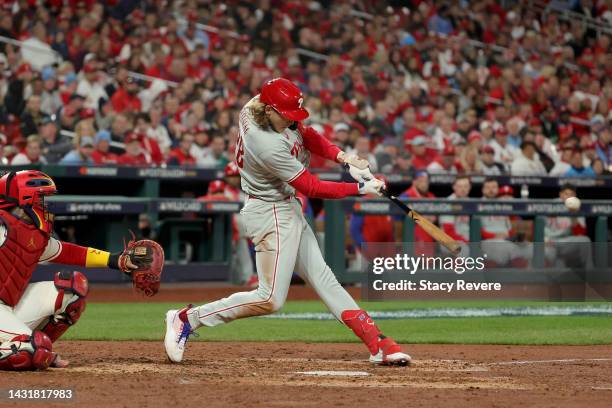 Alec Bohm of the Philadelphia Phillies hits a ground rule double to center field against the St. Louis Cardinals during the fifth inning in game two...