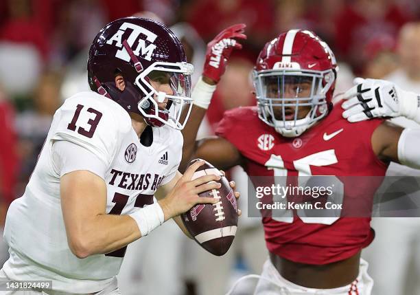 Haynes King of the Texas A&M Aggies looks to pass against the Alabama Crimson Tide during the first half at Bryant-Denny Stadium on October 08, 2022...