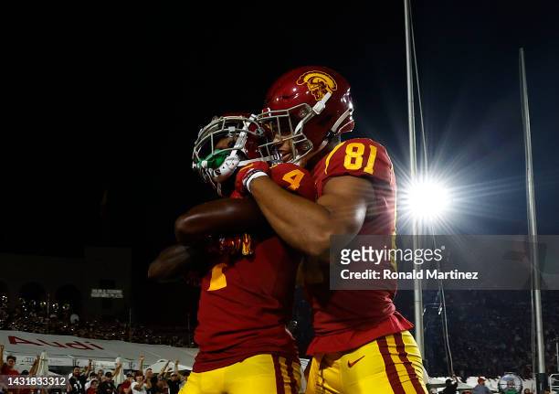 Mario Williams of the USC Trojans celebrates a touchdown with Kyle Ford in the third quarter against the Washington State Cougars at United Airlines...