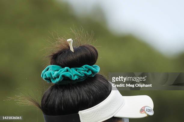 Detail of tees in Lucy Li's hair at the 18th hole during the third round of the LPGA MEDIHEAL Championship at The Saticoy Club on October 08, 2022 in...