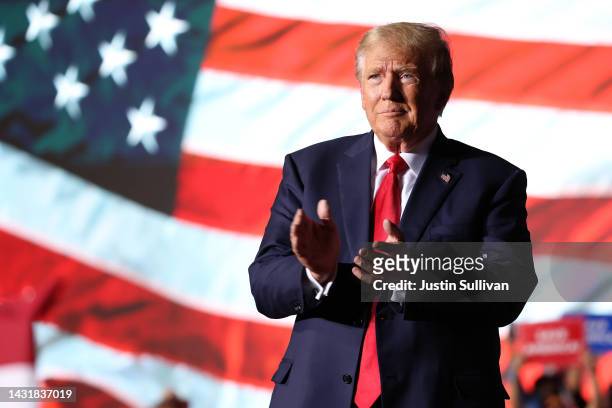 Former U.S. President Donald Trump greets supporters during a campaign rally at Minden-Tahoe Airport on October 08, 2022 in Minden, Nevada. Former...