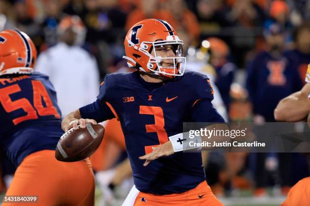 Tommy DeVito of the Illinois Fighting Illini looks to pass during the first quarter in the game against the Iowa Hawkeyes at Memorial Stadium on...