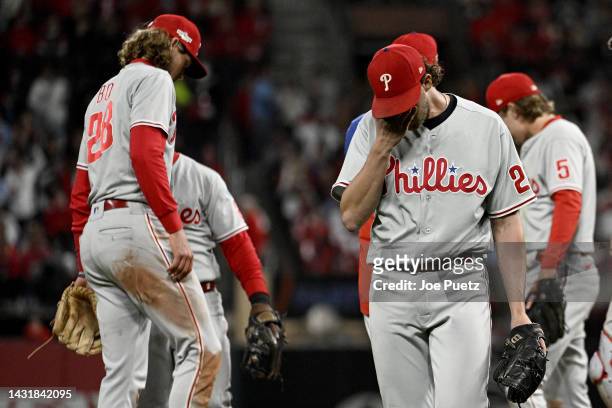 Aaron Nola of the Philadelphia Phillies walks back to the dugout after being relieved against the St. Louis Cardinals during the seventh inning in...