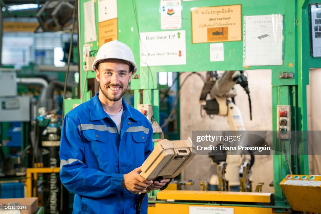 Factory Worker Programming A Cnc Machine High-Res Stock Photo - Getty ...