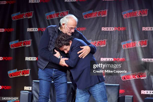 Actors Christopher Lloyd and Michael J. Fox attend a "Back To The Future Reunion" at New York Comic Con on October 08, 2022 in New York City.