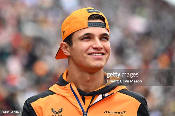 Lando Norris of Great Britain and McLaren looks on from the drivers parade prior to the F1 Grand Prix of Japan at Suzuka International Racing Course...