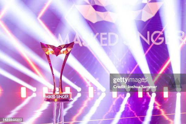 The Masked Singer trophy is seen during the "The Masked Singer" second show at on October 08, 2022 in Cologne, Germany.