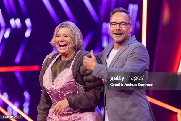 Jutta Speidel aka "Das Walross" and Matthias Opdenhoevel are seen during the "The Masked Singer" second show at on October 08, 2022 in Cologne,...