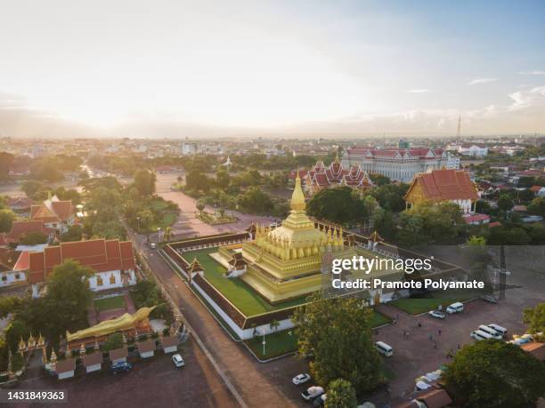 aerial view of phathatluang. it is a gold-covered large buddhist stupa in the center of vientiane, laos. it is generally regarded as the most important national monument in laos and a national symbol - vientiane stock pictures, royalty-free photos & images