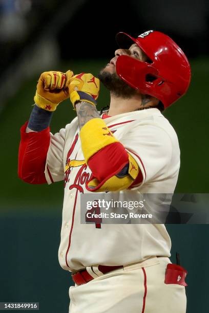 Yadier Molina of the St. Louis Cardinals celebrates after hitting a single to right center field against the Philadelphia Phillies during the ninth...