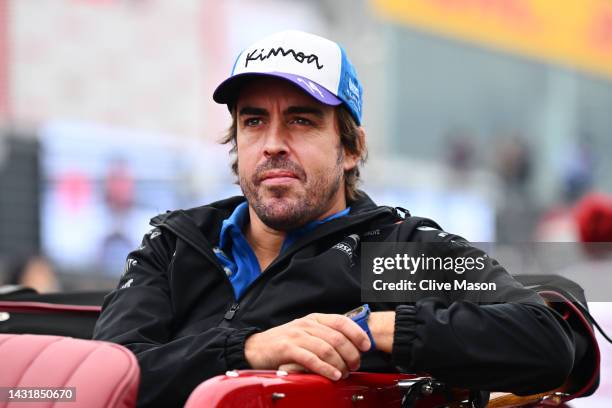 Fernando Alonso of Spain and Alpine F1 looks on from the drivers parade prior to the F1 Grand Prix of Japan at Suzuka International Racing Course on...