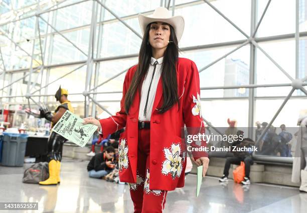 Cosplayer poses as Jupe from "Nope" during day 3 of New York Comic Con on October 08, 2022 in New York City.