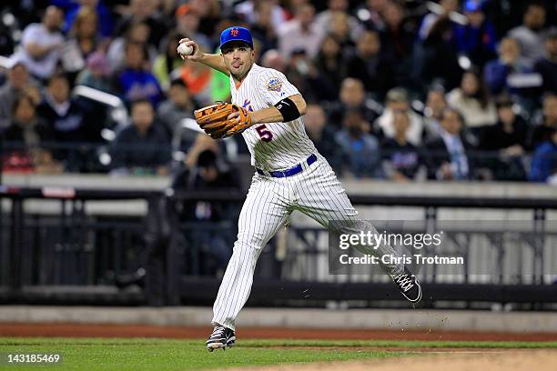 David Wright of the New York Mets throws to first base against the San Francisco Giants at Citi Field on April 20, 2012 in the Flushing neighborhood...