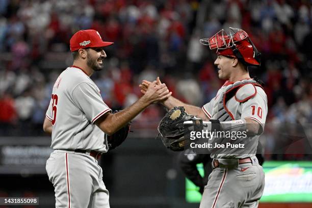 Zach Eflin and J.T. Realmuto of the Philadelphia Phillies celebrate after defeating the St. Louis Cardinals in game two to win the National League...
