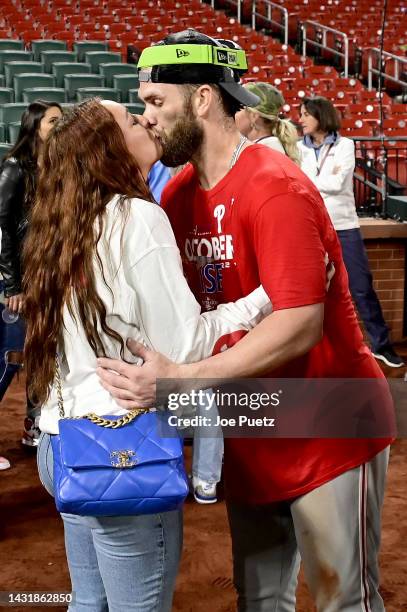 Bryce Harper of the Philadelphia Phillies kisses his girlfriend Kayla Varner after defeating the St. Louis Cardinals in game two to win the National...