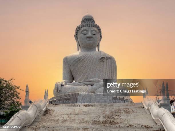 big buddha phuket thailand. top tourist attraction on the southern island of phuket a marble buddha statue on a mountaintop offers panoramic views of the island. thai tourism, vacation, adventure and exploration concept - giant stone heads stock pictures, royalty-free photos & images