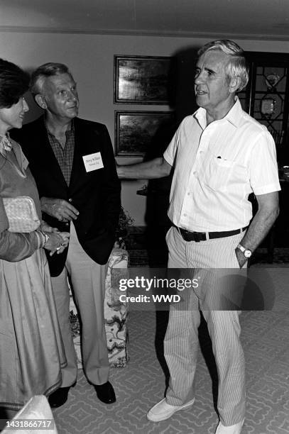 Carol Laxalt, Henry W. Bloch, and Paul Laxalt attend a party at Wexford, an estate rented by the Reagan family during Ronald Reagan's presidential...