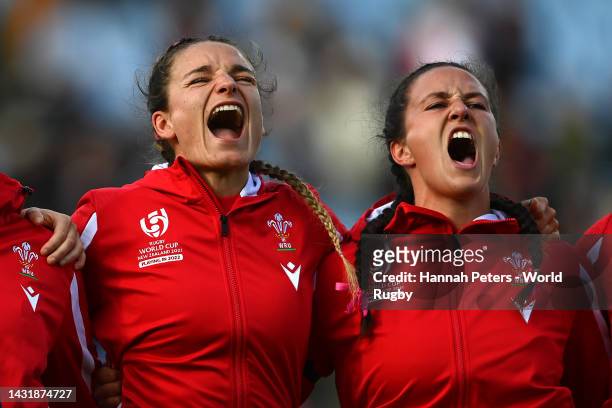 Jasmine Joyce and Sioned Harries of Wales sing their national anthem during the Pool A Rugby World Cup 2021 New Zealand match match between Wales and...