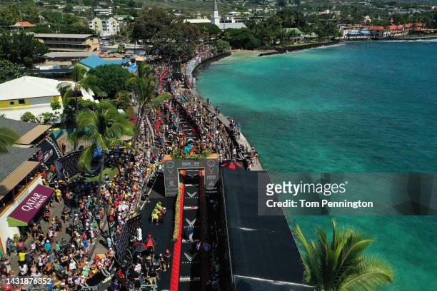 An aerial view as age groupers cross the finish line of the IRONMAN World Championships on October 08, 2022 in Kailua Kona, Hawaii.