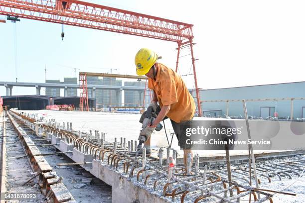 Worker works at the construction site of the Shenzhen-Zhongshan bridge, a part of Shenzhen-Zhongshan Link of the Guangdong-Hong Kong-Macao Greater...