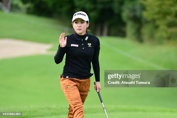 Kana Nagai of Japan acknowledges the gallery after the birdie on the 7th green during the final round of the Stanley Ladies Honda Golf Tournament at...