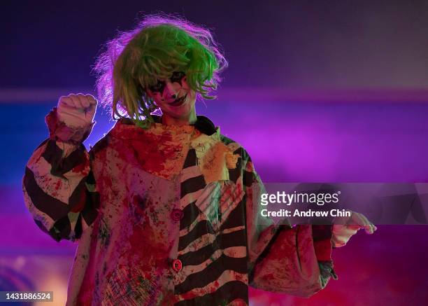 Costumed actor performs in one of the scare zones during Fright Nights at Playland at the PNE on October 08, 2022 in Vancouver, British Columbia,...