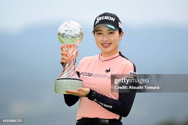 Sakura Koiwai of Japan poses with the trophy after winning the tournament following the final round of the Stanley Ladies Honda Golf Tournament at...