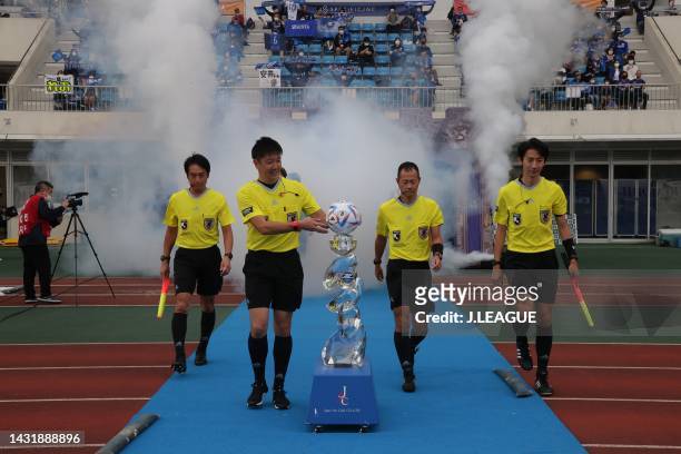 Referees walk into the pitch prior to the J.LEAGUE Meiji Yasuda J2 40th Sec. Match between FC Machida Zelvia and Tochigi SC at Machida GION Stadium...