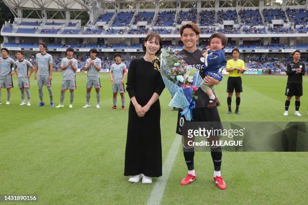 Taiki HIRATO of FC Machida Zelvia and his family poses for photographs to celebrate marking his 200th appearance of J.League match prior to the...