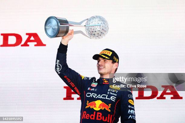 Race winner and 2022 F1 World Drivers Champion Max Verstappen of Netherlands and Oracle Red Bull Racing celebrates on the podium during the F1 Grand...