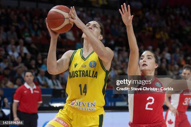 Australia's Marianna Tolo drives to the basket in front of Canada's Aislinn Konig during the 2022 FIBA Women's Basketball World Cup 3rd place match...