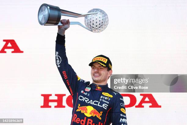 Race winner and 2022 F1 World Drivers Champion Max Verstappen of the Netherlands and Oracle Red Bull Racing celebrates on the podium during the F1...