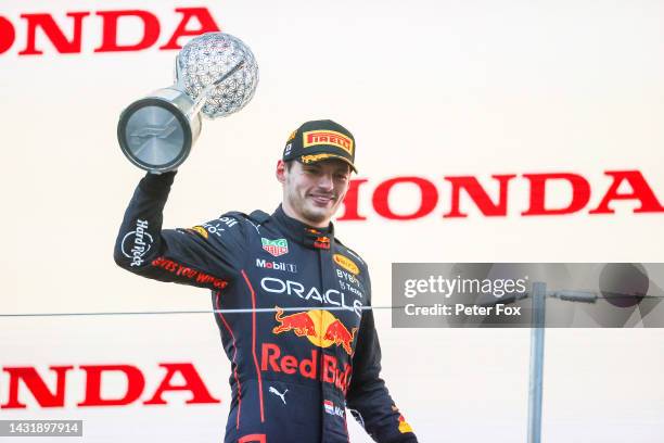 Max Verstappen of Red Bull Racing and The Netherlands celebrates finishing in first position and becoming the 2022 F1 Drivers World Champion during...