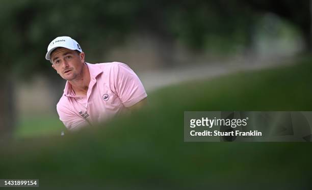 Paul Dunne of Ireland plays a shot on the first hole during Day Four of the acciona Open de Espana presented by Madrid at Club de Campo Villa de...