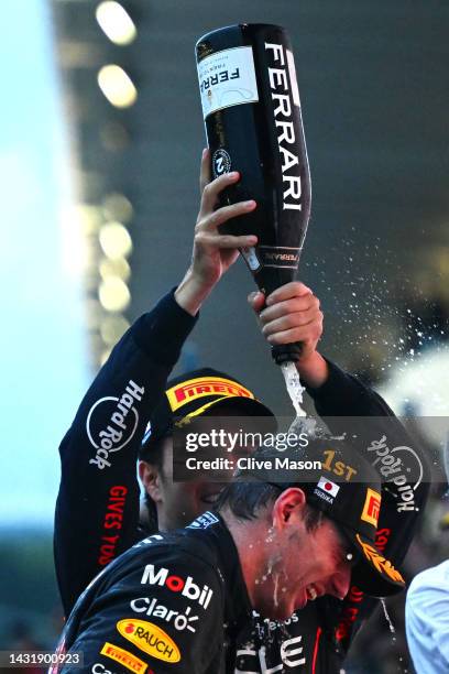 Race winner and 2022 F1 World Drivers Champion Max Verstappen of Netherlands and Oracle Red Bull Racing and Second placed Sergio Perez of Mexico and...