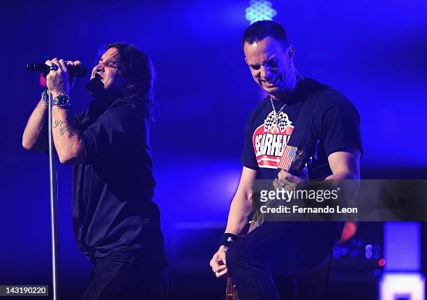 Creed's lead singer Scott Stapp and the band's guitarist Mark Tremonti perform onstage at the Beacon Theatre on April 20, 2012 in New York City.
