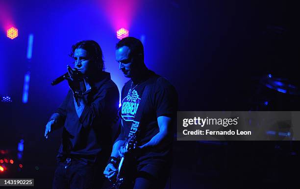 Creed's lead singer Scott Stapp and the band's guitarist Mark Tremonti perform onstage at the Beacon Theatre on April 20, 2012 in New York City.