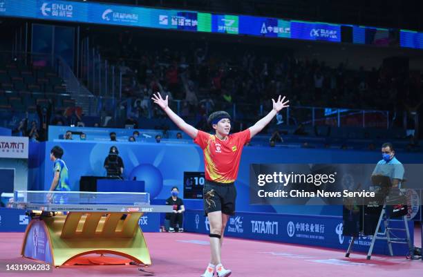 Wang Chuqin of China celebrates after defeating Shunsuke Togami of Japan during the Men's semi-final match between China and Japan on Day 9 of 2022...