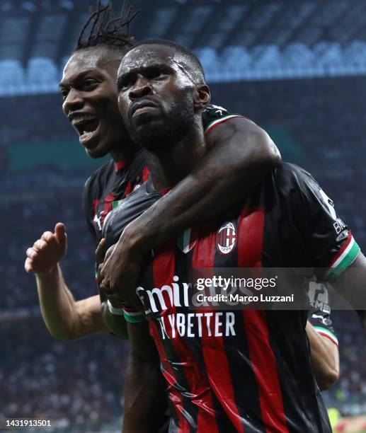 Fikayo Tomori of AC Milan celebrates with his team-mate Rafael Leao after scoring the opening goal during the Serie A match between AC Milan and...
