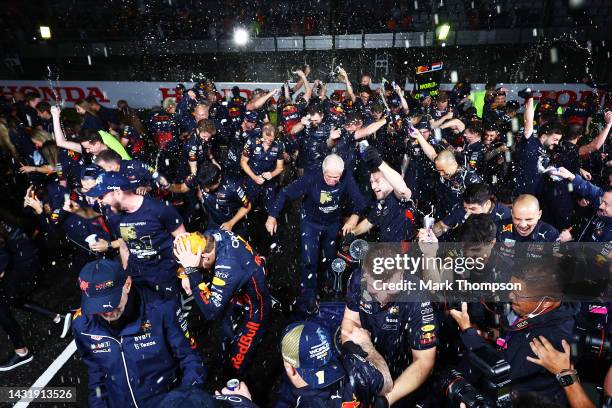 Race winner and 2022 F1 World Drivers Champion Max Verstappen of Netherlands and Oracle Red Bull Racing celebrates with his team after the F1 Grand...