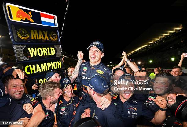 Race winner and 2022 F1 World Drivers Champion Max Verstappen of Netherlands and Oracle Red Bull Racing celebrates with his team after the F1 Grand...