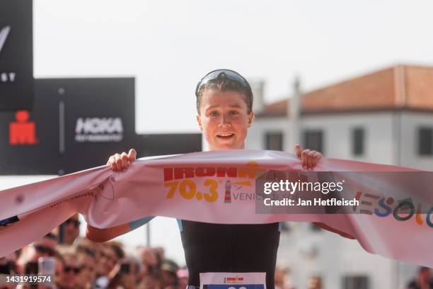 Lucy Byram of Great Britain reacts after crossing the finish line first of the IRONMAN 70.3 Venice-Jesolo on October 09, 2022 in Jesolo, Italy.