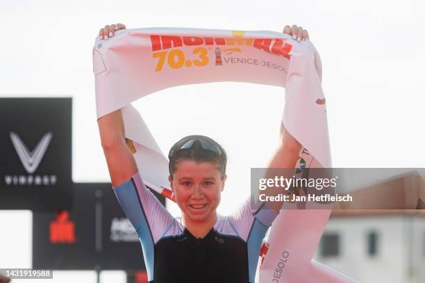 Lucy Byram of Great Britain reacts after crossing the finish line first of the IRONMAN 70.3 Venice-Jesolo on October 09, 2022 in Jesolo, Italy.